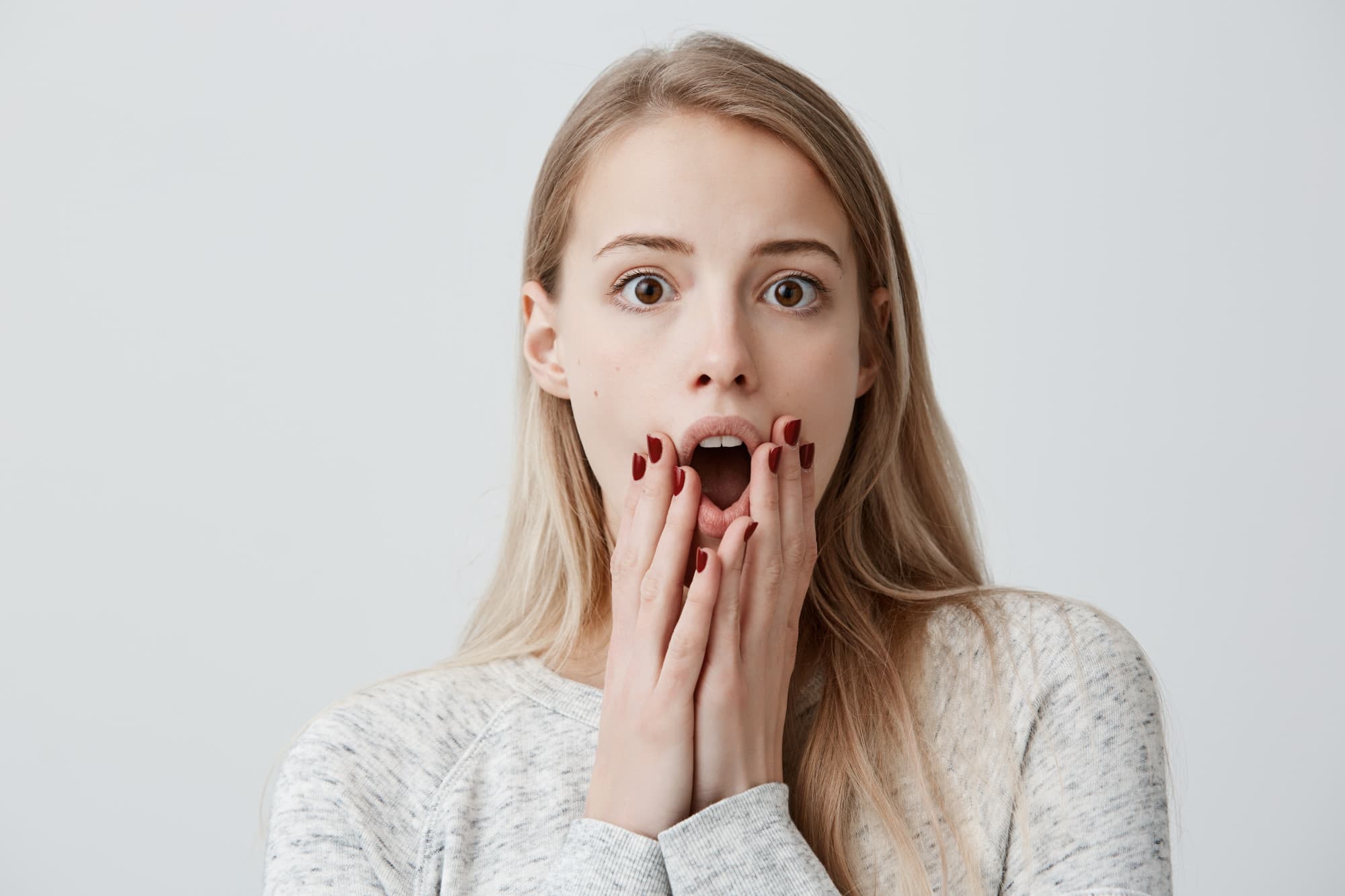Free Photo | Horrified woman with shocked scared look